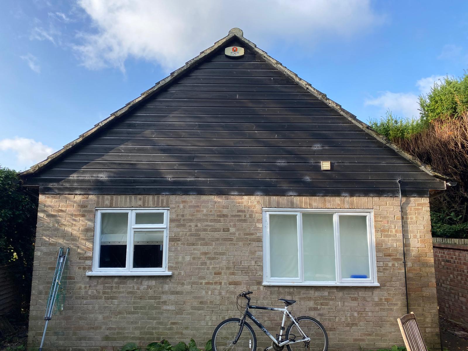 Maintenance — original weathered fascia and gable