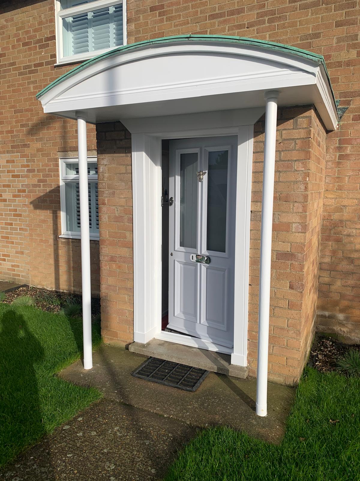 Maintenance — new front door and porch canopy