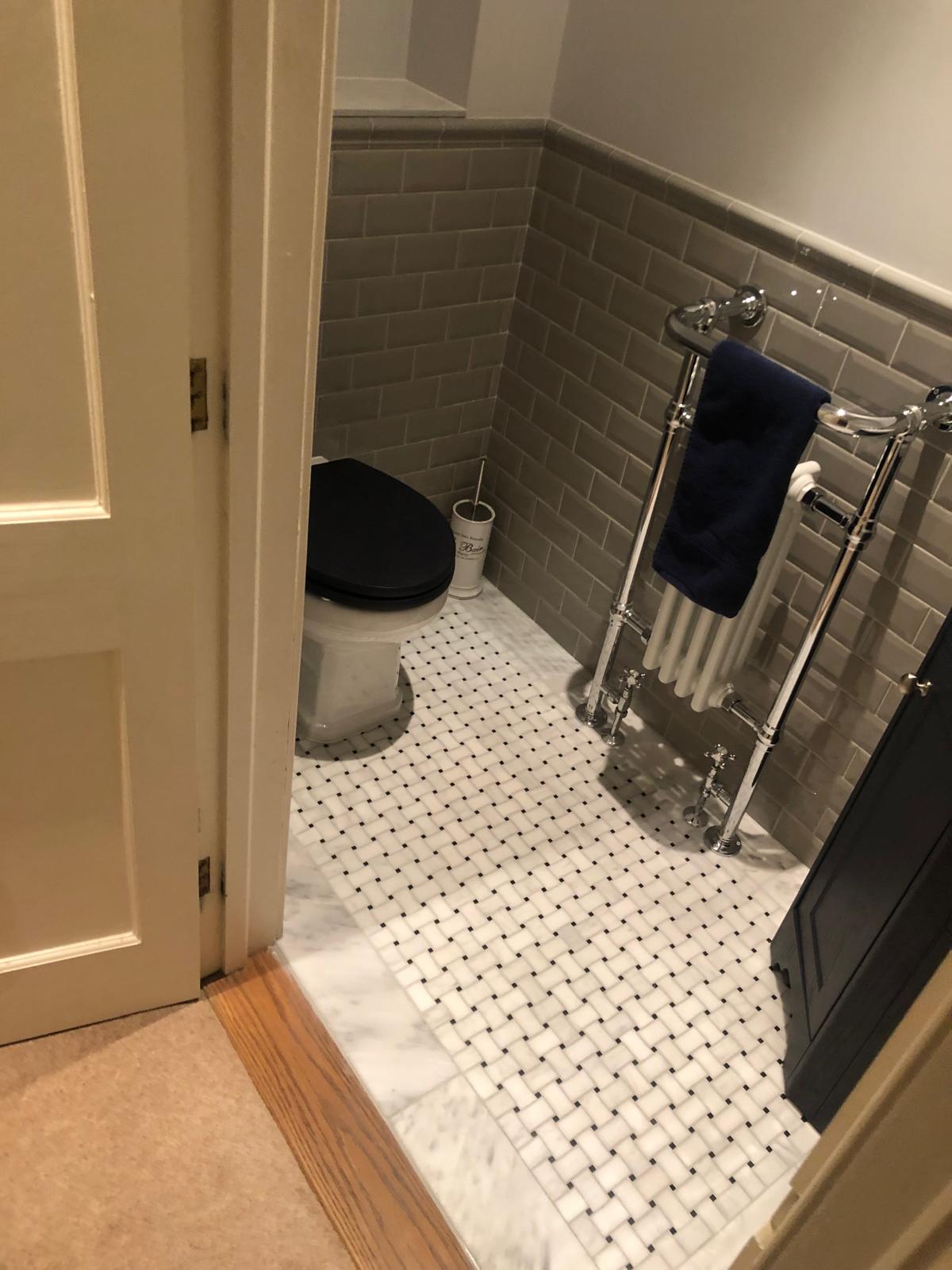 Maintenance — finished bathroom tiling and fittings
